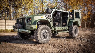 A joint light tactical vehicle parked outdoors