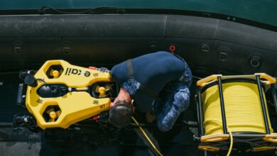 Soldier deploys Exail R7 underwater drone for mine countermeasures test. Photo: Spanish Navy