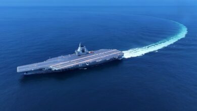 An aerial drone photo taken on May 7, 2024 shows China's third aircraft carrier, the Fujian, during its maiden sea trials. (Photo by Ding Ziyu/Xinhua)