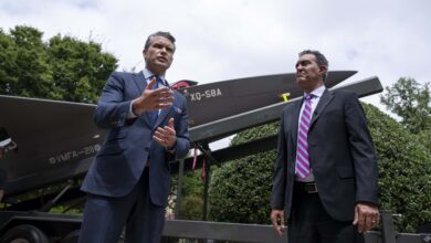 US Defense Secretary Pete Hegseth and Undersecretary of Defense for Research and Engineering Emil Michael deliver remarks to the press while touring multi-domain autonomous displays at the Pentagon, July 16, 2025.