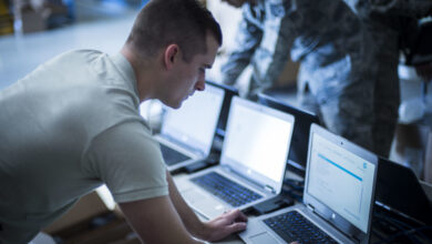 Cyber operator installs software to a laptop