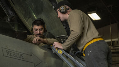 Senior Airman Jaderian James, left, 35th Maintenance Squadron Avionics Flight electronic warfare technician, and Senior Airman Izaak Molina, 14th Fighter Generation Squadron avionics technician, examine a U.S. Air Force F-16 Fighting Falcon’s cockpit and controls during a Combat Shield readiness assessment at Misawa Air Base, Japan, Nov. 5, 2024. Combat shield assessments ensure the integration of defensive systems across air, ground, and space platforms, verifying effective coordination and communication to enhance survivability and mission success. (U.S. Air Force photo by Airman 1st Class Patrick Boyle)