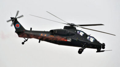 A Chinese WZ-10 attack helicopter performs a flight demonstration at the 2nd China Helicopter Exposition in Tianjin, China, 5 September 2013. The 2nd China Helicopter Exposition, including six flight performances, is being held from September 5 to 8 at Tianjin Airport Economic Zone in Binhai New Area. (Photo by Ke wei / Imaginechina via AFP)