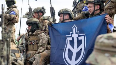 Representatives of the Russian Volunteer Corps (RDK) during a briefing near the border in northern Ukraine