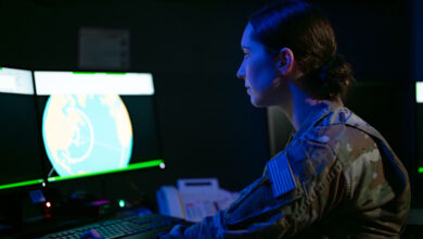 U.S. Space Force Capt. Coleen O'Hara, weapons and tactics flight commander of the 6th Space Warning Squadron (6 SWS), poses in the Upgraded Early Warning Radar (UEWR) facility at Cape Cod Space Force Station, Massachusetts, May 9, 2024. 6 SWS, located at Cape Cod Space Force Station in Sagamore, Massachusetts, is a geographically separated unit of Space Delta 4, Buckley Space Force Base, Colorado. "Team 6" includes U.S. Space Force Guardians, U.S. Air Force and Royal Canadian Air Force Airmen and civilian employees. Their mission is "To surveil air and space to detect missile launches and high-interest satellites while operating, maintaining, and protecting New England’s first Space Force installation.” (U.S. Space Force photo by Dave Grim)
