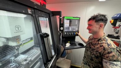 240725-N-ZZ999-2502 KANEOHE BAY, Hawaii (July 25, 2024) U.S. Marine Corps Cpl. Martin Lauterman, assigned to Combat Logistics Company (CLC) 33 at Marine Corps Base Hawaii, operates the milling machine in the SPEE3D Cell to complete a stainless steel part during Exercise Trident Warrior 2024. The exercise brought together personnel from the Naval Postgraduate School, the Marine Innovation Unit, FLEETWERX and industry to demonstrate advanced manufacturing technology in an expeditionary scenario. (U.S. Navy photo)