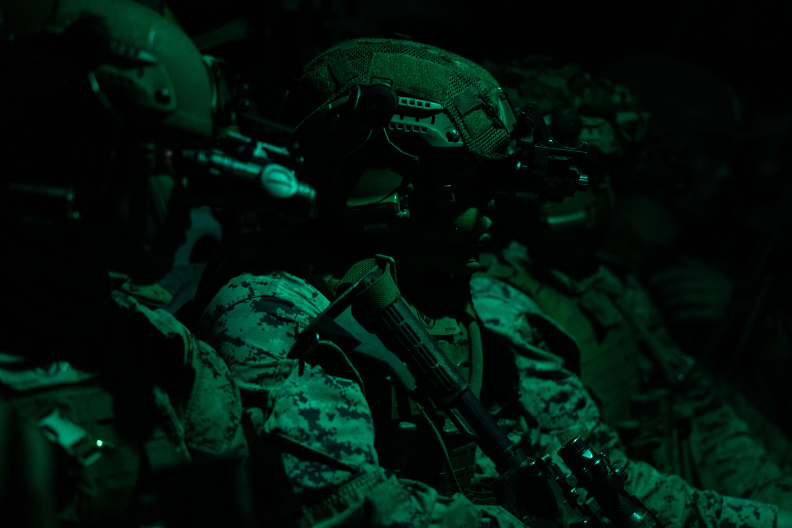 U.S. Marine Corps Lance Cpl. Jan MorenoViloatoro, a mortarman with Kilo Company, Battalion Landing Team, 3rd Battalion, 6th Marine Regiment, 22nd Marine Expeditionary Unit, rides aboard an MV-22B Osprey with Marine Medium Tiltrotor Squadron 263 (Reinforced) during a simulated raid as part of Marine Air-Ground Task Force (MAGTF) Interoperability exercise, at Stone Bay on Marine Corps Base Camp Lejeune North Carolina, Feb. 2, 2025. The raid is one of several training events within MAGTF Interoperability, a course conducted by Expeditionary Operations Training Group (EOTG). This course is designed to train and evaluate integrated elements of the 22nd MEU across a variety of full mission profiles in a simulated peer threat environment. (U.S. Marine Corps photo by Sgt. Nathan Mitchell)