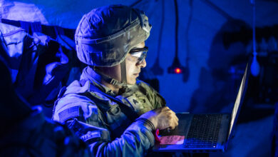 U.S. Army Sgt. Michael Morales, assigned to 41st Field Artillery Brigade, updates Soldier information in a battalion aid station during Saber Guardian 25, Cincu Training Area, Romania, June 13, 2025. The aid station enables rapid triage, treatment, and evacuation of casualties, ensuring readiness and lifesaving support in austere operational environments. (U.S. Army photo by Spc. Hunter Carpenter) Demonstrating global deterrence and the U.S. Army’s ability to rapidly deploy U.S.-based combat power in Europe and the Arctic region alongside Allies and partners, DEFENDER 25 brings U.S. troops together with forces from 29 Allied and partner nations to build readiness through large-scale combat training from May 11-June 24, 2025. DEFENDER 25 increases the lethality of the NATO alliance through large-scale tactical training maneuvers and long-range fires, builds unit readiness in a complex joint, multinational environment and leverages host nation capabilities to increase the U.S. Army’s operational reach. During three large-scale combat training exercises—Swift Response, Immediate Response, and Saber Guardian—Ally and partner forces integrate and expand multi-domain operations capability, demonstrating combined command and control structures and readiness to respond to crisis and conflict.