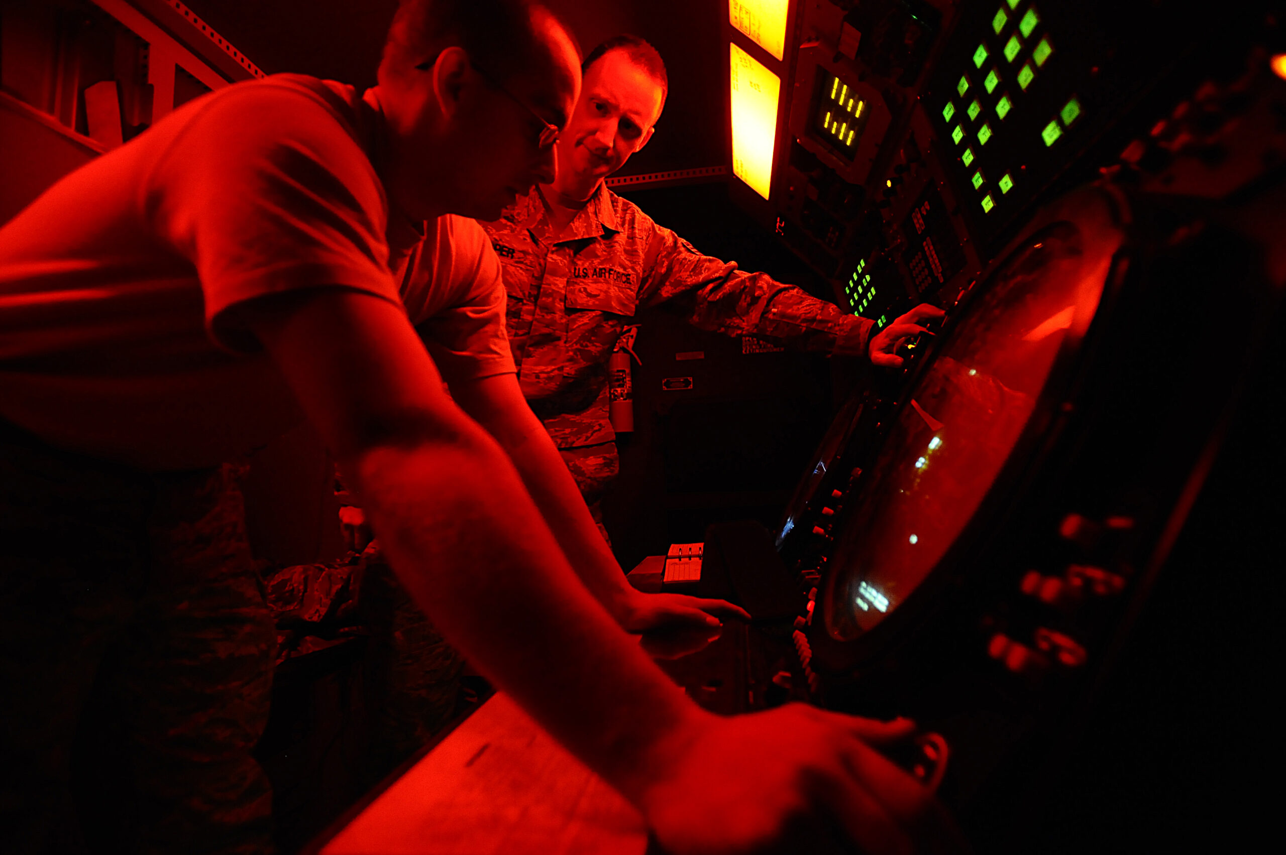 Airman 1st Class Nathaniel Kearn and Staff Sgt. Christopher Loper verify radar data during a preventive maintenance inspection on a mobile radar system at Joint Base Balad, Iraq, Dec. 18. The Airmen are deployed from Mountain Home Air Force Base, Idaho. Kearn, a 727th Expeditionary Air Control Squadron ground radar systems apprentice, is a Harrah, Okla., native. Loper, a 727th EACS ground radar systems supervisor, is a Houston native.