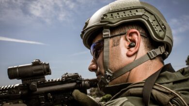 Soldier wearing ear piece. Photo: Silynxcom