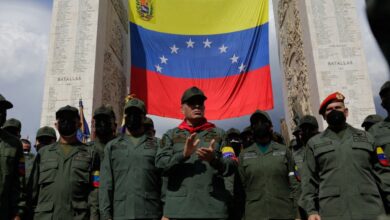Defense Minister Vladimir Padrino Lopez participates in the march to commemorate the 30th anniversary of February 4, 1992, in Caracas, Venezuela.