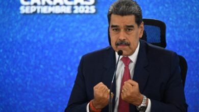 Venezuelan President Nicolas Maduro addressing a press conference while in front of blue screen