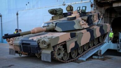 An Australian Army M1A2 Abrams main battle tank boards HMAS Adelaide during sea transportability trials at the Port of Townsville, Queensland. Photo: Lieutenant Commander Anthony Martin