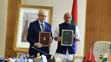 Indian Defense Minister Rajnath Singh signs defense agreement with his Moroccan counterpart Abdeltif Loudiyi.