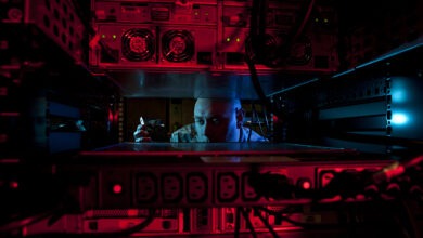 U.S. Air Force Staff Sgt. Jerome Duhan, 97th Communications Squadron network administrator, inserts a hard drive into a retina server inside the 97th network control center Jan. 24, 2014. The 97th Air Mobility Wing is scheduled to undergo its first phase three Command Cyber Readiness Inspection during the week of Jan. 27, 2014. Base members can assist by removing their common access cards from the computer the moment they walk away. (U.S. Air Force photo by Senior Airman Franklin R. Ramos/Released)