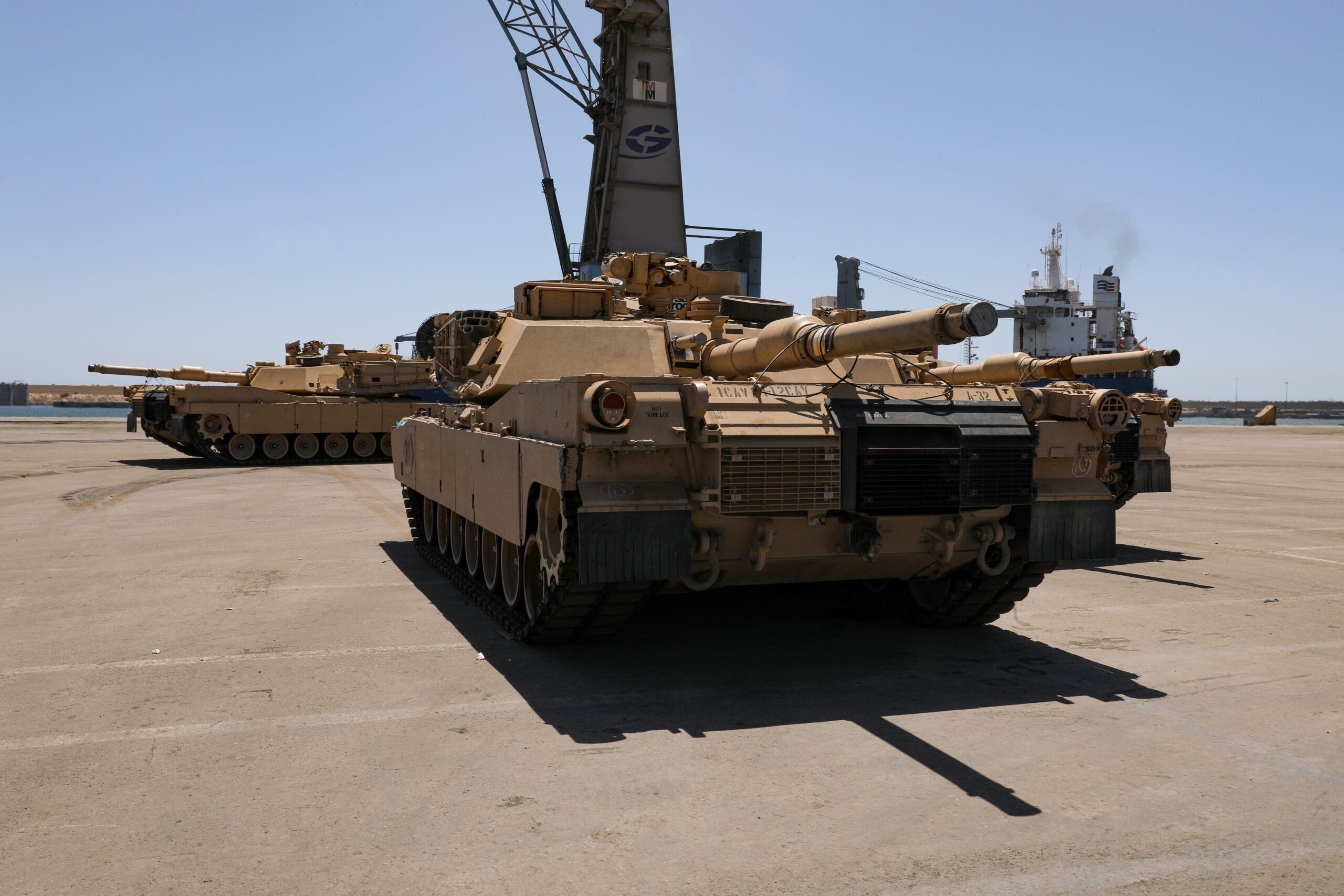 A U.S. Army M1A3 Abrams Tanks from the 1-12 Cavalry Squadron, 1st Cavalry Division move to position to be secured for transportation at the Port of Agadir, June 3, 2022, Agadir, Morocco. African Lion 2022 is U.S. Africa Command’s largest, premier, joint, annual exercise hosted by Morocco, Ghana, Senegal and Tunisia, June 6 - 30. More than 7,500 participants from 28 nations and NATO train together with a focus on enhancing readiness for U.S. and partner nation forces. AL22 is a joint all-domain, multi-component and multinational exercise, employing a full array of mission capabilities with the goal to strengthen interoperability among participants and set the theater for strategic access. (U.S. Army photo by PFC Donald Franklin)