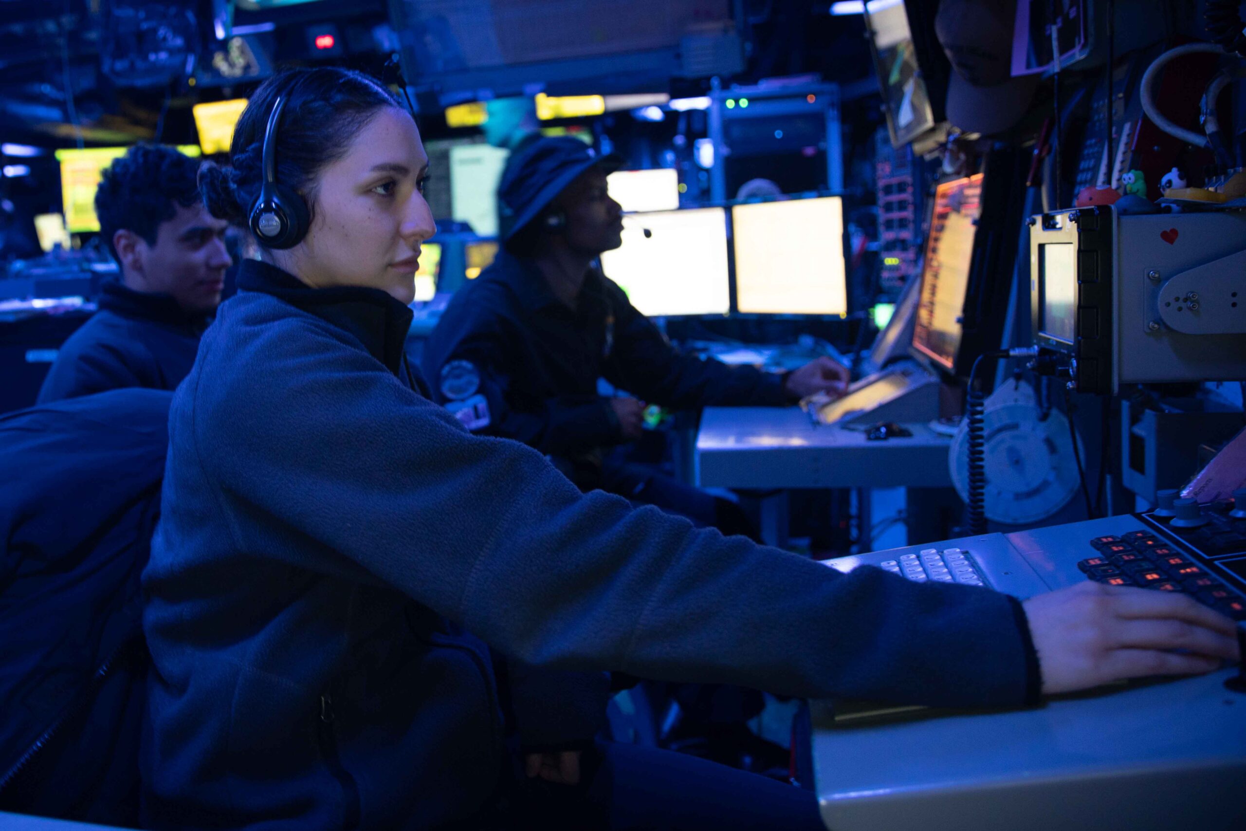 Cryptologic Technician (Technical) 2nd Class Kapri Besser monitors shipboard sensors aboard amphibious assault ship USS Makin Island (LHD 8), May 31, 2023 in the Pacific Ocean. Cryptologic Technicians conduct Electronic Warfare by operating and maintaining electronic sensors and computer systems in accordance with fleet and national tasking. The Makin Island Amphibious Ready Group, comprised of amphibious assault ship Makin Island and amphibious transport docks USS Anchorage (LPD 23) and USS John P. Murtha (LPD 26), is underway conducting routine operations in U.S. 3rd Fleet with the embarked 13th Marine Expeditionary Unit. (U.S. Navy photo by Mass Communication Specialist Seaman Apprentice Dominic Delahunt)