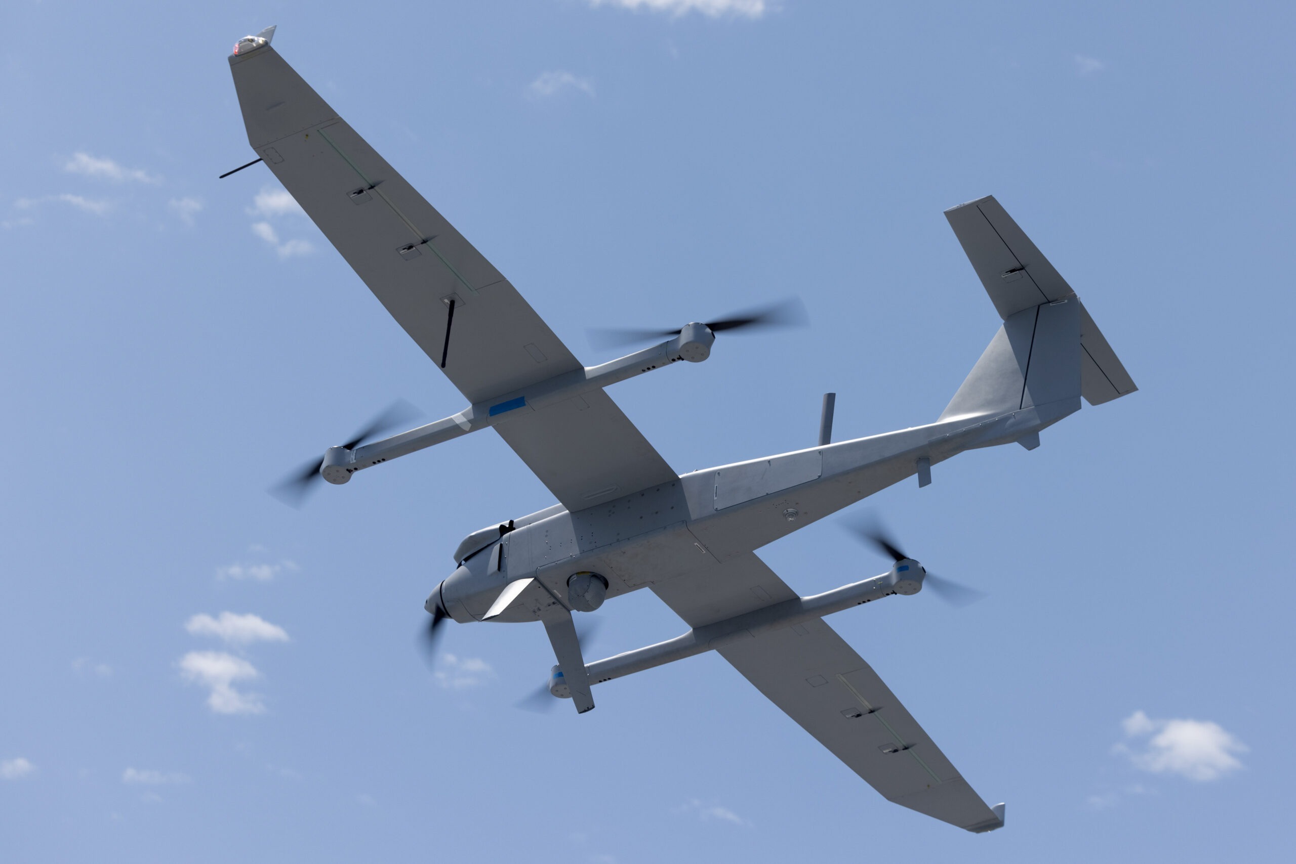 A Jump 20 group 3 Unmanned Aerial System takes off during Amphibious Ready Group Marine Expeditionary Unit exercise (ARGMEUEX), aboard the San Antonio-class amphibious transport dock ship USS San Antonio (LPD 17), Iwo Jima ARG (IWOARG), while underway in the Atlantic Ocean, May 15, 2025. During ARGMEUEX, the 22nd MEU, aboard IWOARG shipping, conducts training in support of various mission essential tasks that enhance operational readiness and lethality as a unified IWOARG/22 MEU team. (U.S. Marine Corps photo by Lance Cpl. Kyle Baskin)