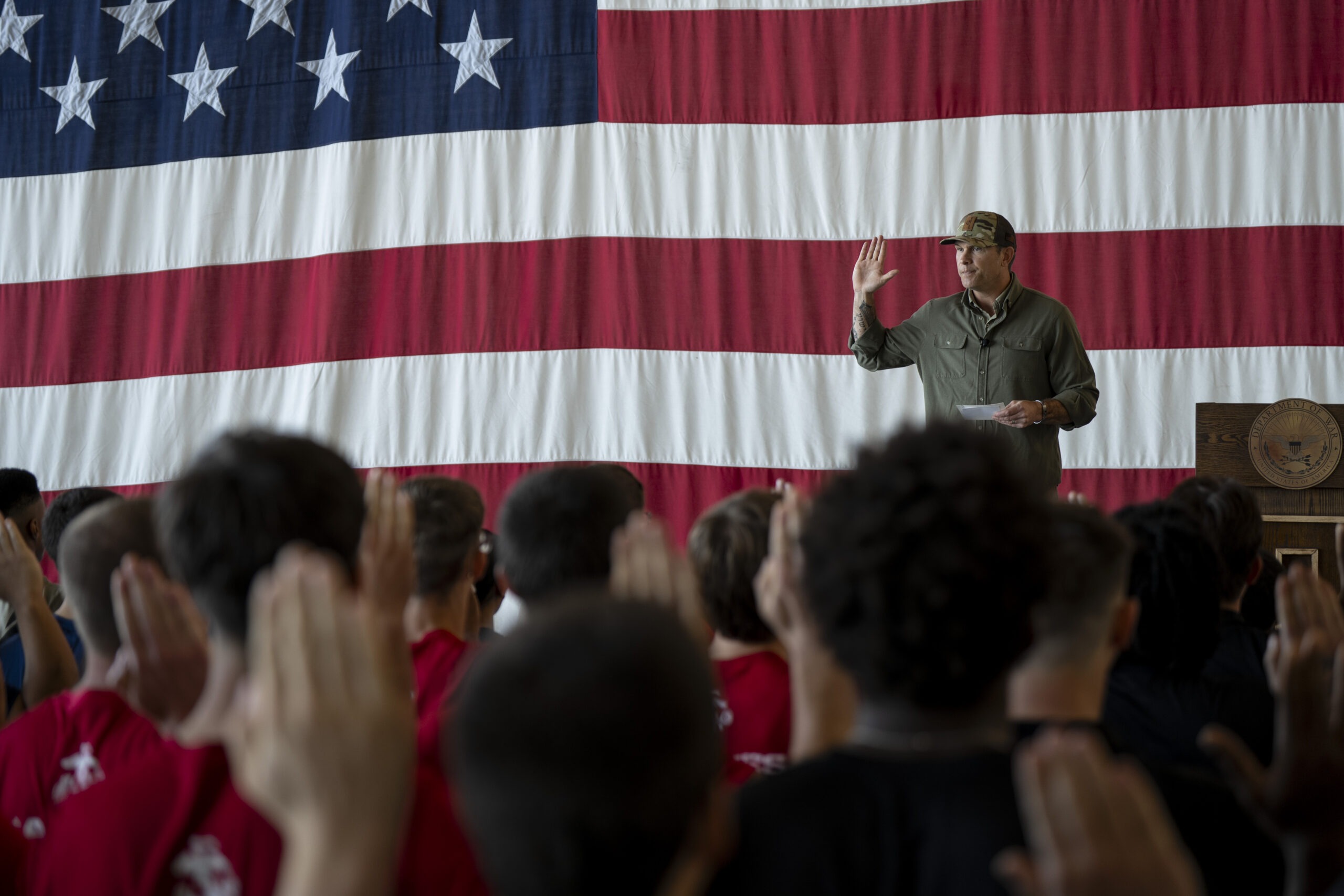 Secretary of War Pete Hegseth administers the oath of enlistment to recruits during his visit to Naval Air Station Oceana, Va., Oct. 7, 2025. (DoWW photo by U.S. Navy Petty Officer 1st Class Alexander Kubitza)