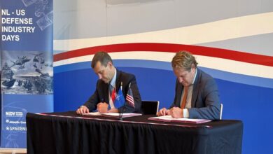 From L: GA-ASI CEO Linden Blue and Dutch Minister for Arms Procurement and Personnel Gijs Tuinman signing the deal to co-produce a small unmanned aircraft system