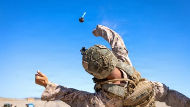 U.S. Marine Corps Lance Cpl. Bradon Kennedy, a rifleman with Kilo Company, Battalion Landing Team 3/5, 11th Marine Expeditionary Unit, throws an M67 training grenade during a live-fire range as part of MEU Exercise 26.1 on Marine Corps Base Camp Pendleton, California, Oct. 27, 2025. During MEUEX, BLT 3/5 conducted company-level training, live-fire ranges and battle drills, employing various weapon systems to maintain mission readiness. (U.S. Marine Corps photo by Sgt. Trent A. Henry)