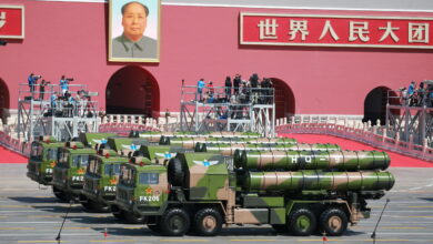 Military vehicles carrying HQ-9 medium- to long-range surface-to-air missiles march past the Tiananmen Rostrum during the military parade to commemorate the 70th anniversary of the victory in the Chinese People's War of Resistance Against Japanese Aggression in Beijing, China, 3 September 2015. China has pledged to cut the number of troops in its army by 300,000, in an unexpected announcement made by Chinese president Xi Jinping on Thursday (3 September 2015). Xi disclosed the news during a speech made before the beginning of a huge military parade in Beijing's Tiananmen Square, held to mark the end of World War II and celebrate China's victory over Japan. Xi said that a 13% cut would be made in the country's 2.3 million-armed forces, stressing that China was committed to peace, although he gave no indication of when it would be implemented. "War is like a mirror," he said. "Looking at it helps us better understand the value of peace. China will remain committed to peaceful development. We Chinese love peace." China has cut the size of its military three times since the 1980s, according to media reports. (Photo by Ge jinfh / Imaginechina via AFP)