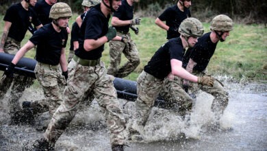 Soldiers from number 3 Company carry the log during the race. The Coldstream Guards dig in on Windsor Great Park. Physical prowess and an unshakeable will to succeed are vital requirements for Guardsmen in the British Army. To test themselves the infantry soldiers of the Coldstream Guards take on the tough physical and mental challenge of a log race in Windsor Great Park. While it may look like a walk in the park, the task of carrying a 100kg metal “log” around a 3,000-metre course is one of the most difficult trials that a soldier faces. Teams of 12 personnel are required to shepherd their load over undulating, boggy terrain at full speed – only six pairs of hands are allowed to hold the weight any one time.