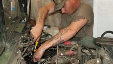 Spc. Gregory Wilson, a mechanic with Fox Company, 700th Brigade Support Battalion, 45th Infantry Brigade Combat Team, works to repair the fuel system on a Humvee while deployed in support of the Joint Multinational Training Group-Ukraine at the Yavoriv Combat Training Center on the International Peacekeeping and Security Center in Western Ukraine on Aug. 9, 2017