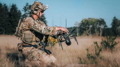 A soldier from the Army’s 75th Ranger Regiment prepares a Neros Archer Strike drone for flight. Army photo by Spc. Luke Sullivan.