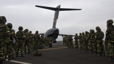 Burundian soldiers prepare to load onto a U.S. Air Force C-17 Globemaster III aircraft at Bujmumbura International Airport in Burundi Dec. 13, 2013. U.S. military aircraft were dispatched to transport Burundian forces to Bangui, Central African Republic, in support of an African Union effort to quell violence there. (U.S. Air Force photo by Staff Sgt. Erik Cardenas/Released)