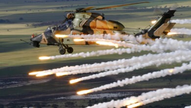 Air to Air of Tiger ARH A38-001 performing a jettison of it's Counter Measure Dispensing System. At the Port Wakefield proving ground. Trial E3032 Tiger ARH CMDS
