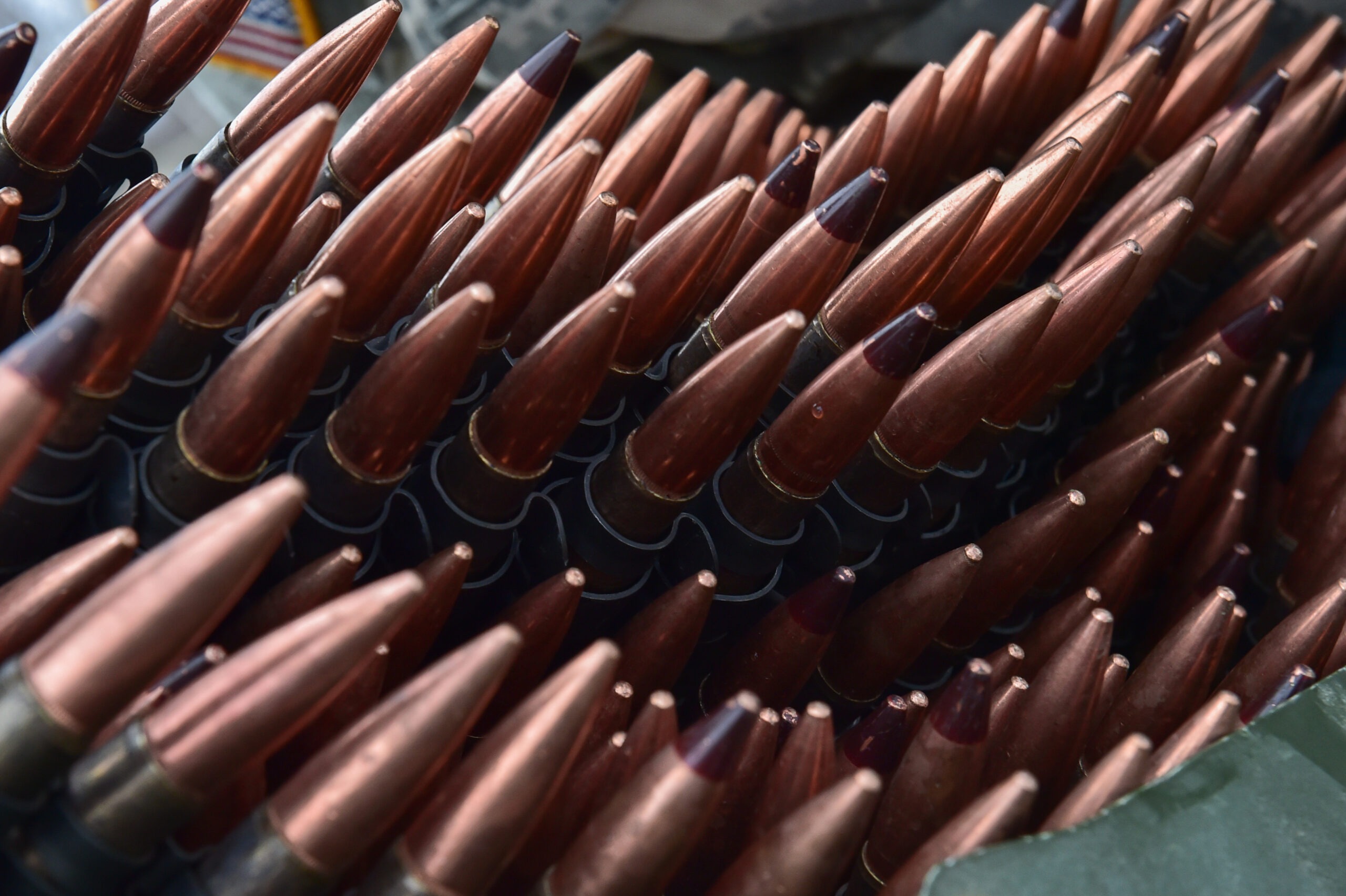 Machine gun ammunition is seen stacked at a supply point as Soldiers assigned to the 95th Chemical Company, “Arctic Dragons”, 17th Combat Sustainment Support Battalion, U.S. Army Alaska, prepare to execute a gunnery live-fire exercise with M1135 Stryker Nuclear Biological Chemical Reconnaissance Vehicles on Joint Base Elmendorf-Richardson, Alaska, April 5, 2017. The gunnery tested Soldier’s proficiency with identifying, engaging, and eliminating hostile targets while increasing combat effectiveness. The Styker NBCRV provides Nuclear, Biological, and Chemical detection and surveillance for battlefield visualization, and situational awareness to increase unit combat power. The core of the NBCRV is its on-board integrated NBC sensor suite, and integrated meteorological system. An NBC positive overpressure system minimizes cross-contamination of samples and detection instruments, provides crew protection, and allows extended operation at Mission Oriented Protective Posture. (U.S. Air Force photo/Justin Connaher)