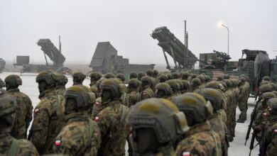 Troops in front of the WISLA air defense system