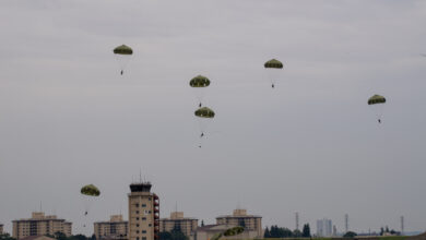 Japan Ground Self-Defense Force paratroopers with the 1st Airborne Brigade and descend after jumping from a U.S. Air Force C-130J Super Hercules assigned to the 36th Airlift Squadron during the Japanese-American Friendship Festival 2024 at Yokota Air Base, Japan, May 19, 2024. The JGSDF 1st Airborne brigade conducted HALO and static-line jump demonstration to show their capabilities during the festival. The festival is aimed at increasing bilateral relationships between U.S. and Japanese communities and allows people to see U.S. and Japanese military capabilities first-hand. (U.S. Air Force photo by Yasuo Osakabe)
