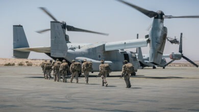 U.S. Marines with 2nd Battalion, 8th Marine Regiment, 2nd Marine Division, board an MV-22B Osprey assigned to Marine Medium Tiltrotor Squadron (VMM) 165, Marine Aircraft Group 16, 3rd Marine Aircraft Wing, during Service Level Training Exercise 4-25 at Marine Corps Air-Ground Combat Center, Twentynine Palms, California, Aug. 13, 2025. SLTE 4-25 is designed to be a challenging, realistic training environment that produces combat-ready forces capable of operating as an integrated Marine Air-Ground Task Force across all domains of military operations. (U.S. Marine Corps photo by Lance Cpl. Alexis Ibarra)