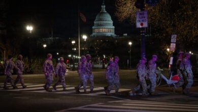 U.S. service members line the streets of Washington, D.C., during an honor escort—also known as a fallen soldier procession—for U.S. Army Spc. Sarah Beckstrom of the West Virginia National Guard, Nov. 27, 2025. The tradition honors fallen soldiers with silent, unified respect as they are escorted to their final resting place. (U.S. Army National Guard photo by Sgt. Angelina Tran)