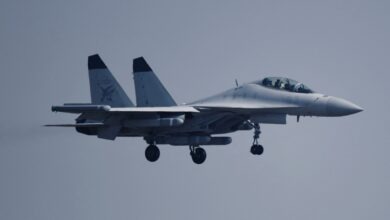 In Zhuhai, China, on November 12, 2024, J-15 series carrier-based aircraft perform a flight during The 15th China International Aviation and Aerospace Exhibition in Zhuhai, Guangdong province, China. On the same day, the Navy J-15 series carrier-based aircraft formation, composed of 1 J-15D aircraft and 2 J-15T aircraft, conducts a flight demonstration over Zhuhai Jinwan Airport. (Photo by Costfoto/NurPhoto) (Photo by CFOTO / NurPhoto via AFP)