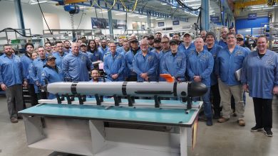 HII engineers and technicians celebrate the completion of the 42nd Lionfish small unmanned underwater vehicle (SUUV) for the U.S. Navy at the company’s unmanned production facility in Pocasset, Massachusetts.
