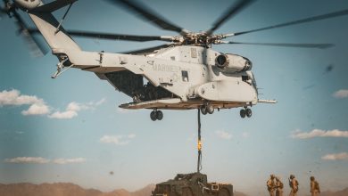 U.S. Marine Corps CH-53K King Stallion aircraft assigned to Marine Aviation Weapons and Tactics Squadron One (MAWTS-1) lifts a Joint Light Tactical Vehicle during a heavy lift exercise as part of Weapons and Tactics Instructor course 1-26 at near Marine Corps Air Station, Yuma, Arizona, Sept. 30, 2025. WTI is a seven-week training event hosted by MAWTS-1 which emphasizes operational integration of the six functions of Marine aviation in support of the Marine Air Ground Task Force, Joint and Coalition Forces. (U.S. Marine Corps photo by Lance Cpl. Fabian Ortiz)