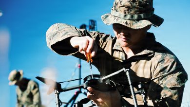 A U.S. Marine Corps rifleman with Weapons Company, Battalion Landing Team 3/6, 22nd Marine Expeditionary Unit (Special Operations Capable), prepares a Neros Archer first-person view drone during attack drone training on Camp Santiago, Puerto Rico, Nov. 22, 2025. 22nd MEU(SOC) Marines are being trained and certified by the 2d Marine Division and the Marine Corps Attack Drone Team on first-person view drone systems to enhance combat readiness. U.S. military forces are deployed to the Caribbean in support of the U.S. Southern Command mission, Department of War-directed operations, and the president's priorities to disrupt illicit drug trafficking and protect the homeland. (U.S. Marine Corps photo)