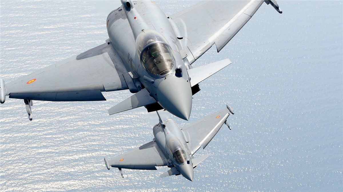 An aerial shot from above of two grey Eurofighters that will carry meteor missile.