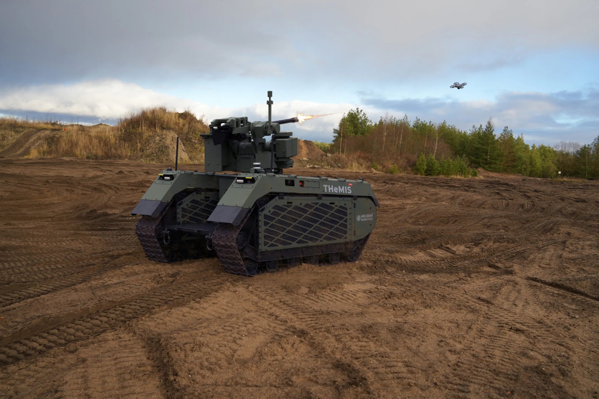 A Tracked Hybrid Modular Infantry System (THeMIS) unmanned ground vehicle firing on a drone