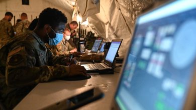 U.S. Air Force members of the utilize computer communication systems during the Agile Flag 21-2 experiment at Naval Outlying Landing Field Choctaw, Florida, May 3, 2021. Air Combat Command developed the Agile Flag 21-2 experiment to create a lead wing, aligning squadrons from different locations under a single commander, enhancing their readiness as a team before deploying into a contested environment. (U.S. Air Force photo by Senior Airman Sarah Dowe)