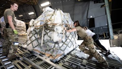 Senior Airman Jenna Hayes, a loadmaster assigned to the 709th Airlift Squadron, and Taylor Kastenhuber, a traffic management office contractor with Criterion East, push a pallet of medical supplies bound for Honduras at Pittsburgh International Airport Air Reserve Station on Nov. 6, 2024. In total 32 pallets totaling nearly 8,000 pounds of cargo were transported in support of the Denton Program. (U.S. Air Force photo taken by Master Sgt. Jeffrey Grossi)