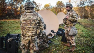 Soldiers surround a satellite network tied to the effort to boost JADC2