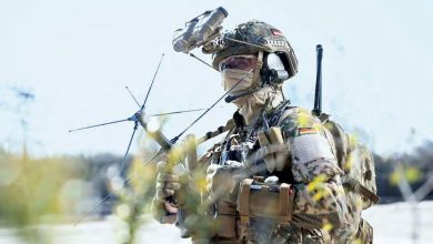 A Special Operations Forces Command soldier wearing satellite communications equipment.