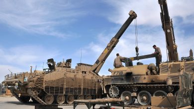 Pictured are REME Vehicle Mechanics from ES Bn (Equipment Support Battalion) changing a Power Plant on a CRARRV (Challenger Armoured Recovery Repair Vehicle) using a second CRARRV during Op Herrick 15. The Challenger Armoured Repair and Recovery Vehicle (CRARRV) is a highly evolved armoured vehicle designed to recover and repair damaged tanks on the battlefield. The vehicle has two winches, main and auxiliary, and an Atlas hydraulically operated crane capable of lifting a complete Challenger 2 power pack. A modern, high-tech Army needs highly trained men and women to keep equipment working. The role of the Royal Electrical and Mechanical Engineers (REME) is to do just that; maintain, repair and manufacture equipment to keep battle winning aircraft, tanks and weapons in fighting order. The REME exists to Ôkeep the punch in the ArmyÕs fistÕ. Every part of the British Army has a REME detachment within it allowing opportunity around the world from Belize, to Canada, to Cyprus, to Kenya. REME has a set ofÊeight trades: Armourer, Recovery Mechanic, Avionics Technician, Electronics Technician, Metalsmith, Vehicle Mechanic, Aircraft Technician and Technical Support Specialist. From repairing Challenger tanks at the forefront of the battle to maintaining the Apache Attack Helicopter, REME keeps up to date with the latest in advanced technologies and complex equipment, constantly evolving our training programme to make the seemingly impossible possible.