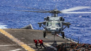 190710-N-ZH865-1250 ATLANTIC OCEAN (July 10, 2019) Sailors clear the flight deck aboard the Wasp-class amphibious assault ship USS Kearsarge (LHD 3) after attaching a pallet of ordnance to an MH-60S Sea Hawk helicopter during an ammunition offload. Kearsarge is the flagship for the Kearsarge Amphibious Ready Group. The Kearsarge ARG is deployed in support of maritime security operations, crisis response and theater security cooperation, while providing a forward naval presence. (U.S. Navy photo by Mass Communication Specialist Seaman Vincent Zaragozi/Released)
