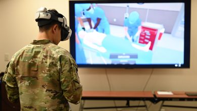U.S. Air Force Senior Airman Martin Gamez Corral, 28th Health Care Operations Squadron ambulance services medical technician, operates a virtual reality simulator at Ellsworth Air Force Base, S.D., Oct. 30, 2025. This VR system allows Airmen to train for simulated specific healthcare situations. (U.S. Air Force Photo by Airman 1st Class Addison Bolt)