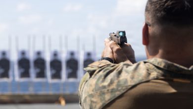 A U.S. Marine with Maritime Special Purpose Force, 22nd Marine Expeditionary Unit (Special Operations Capable), fires an M18 pistol during a qualification range aboard San Antonio-class amphibious transport dock USS Fort Lauderdale (LPD 28), while underway in the Caribbean Sea, Feb. 22, 2026. U.S. military forces are deployed to the Caribbean in support of the U.S. Southern Command mission, Department of War-directed operations, and the president’s priorities to disrupt illicit drug trafficking and protect the homeland. (U.S. Marine Corps photo)